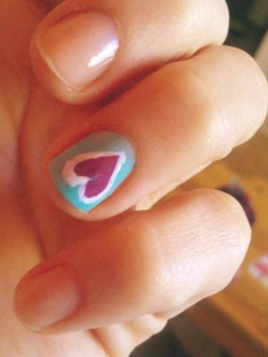 Vladka Chalyova's rainbow heart nail